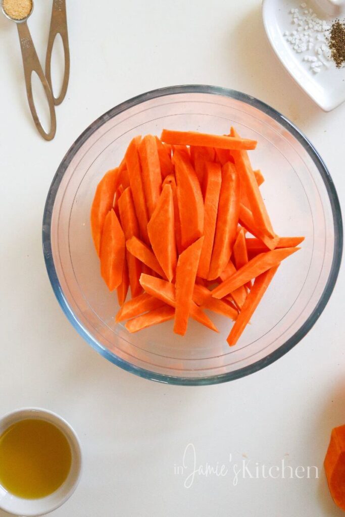 crispy-sweet-potato-fries-crispy-sweet-potato-fries-baked-easy-potato-recipes-sides-for-pork-chops-healthy-fries-best-potato-recipes-sweet-potato-crisps-air-fryer-fries-seasoned-french-fry-recipe-In-Jamies-Kitchen